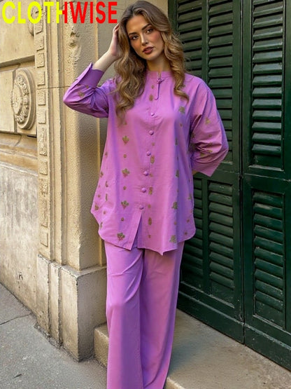 Woman wearing a purple outfit with 'CLOTHWISE' branding in the corner.