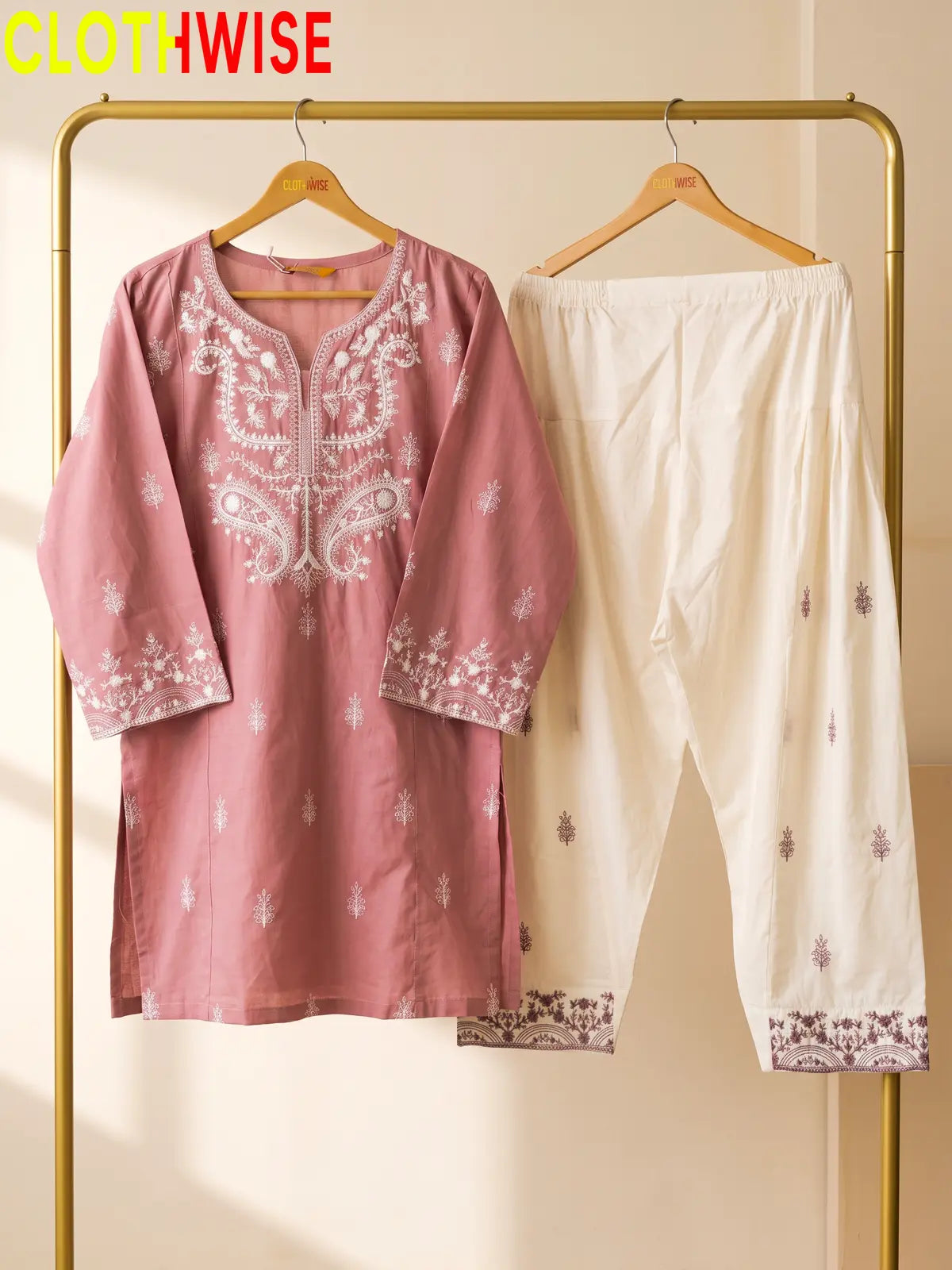 Mushq Dusty Pink 2-piece embroidered cotton suit on hanger