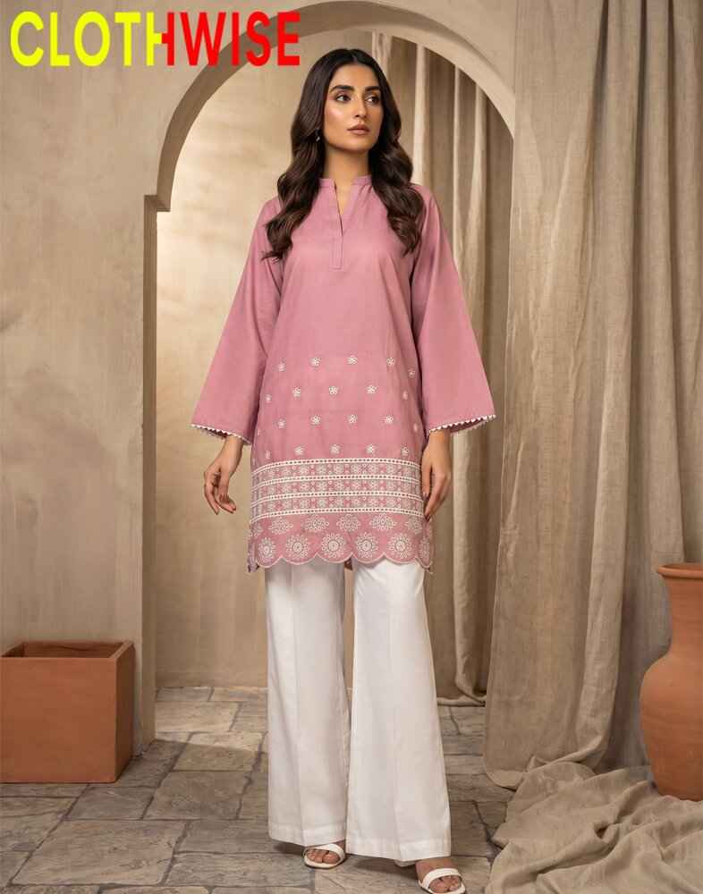 Woman wearing a pink kurta with white pants in a decorative setting with 'CLOTHWISE' branding.