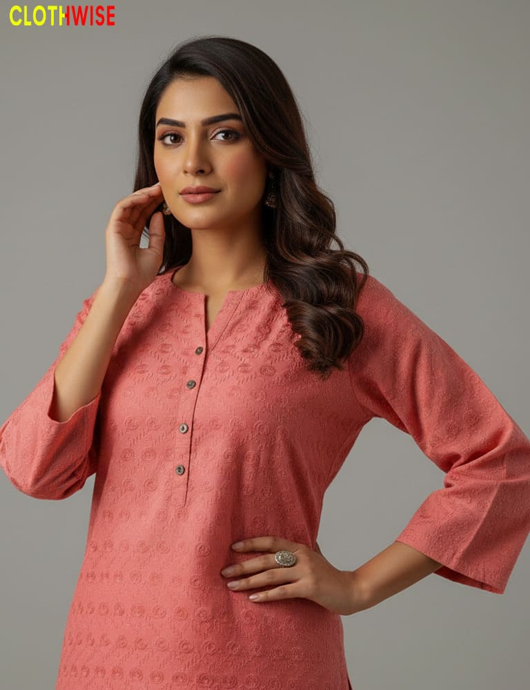Woman wearing a pink kurta with a gray background, featuring the 'Clothinwise' brand.