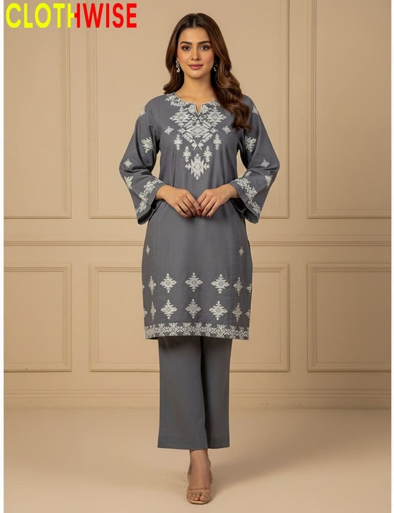 Woman wearing a gray embroidered outfit with 'CLOTHWISE' branding on a beige background