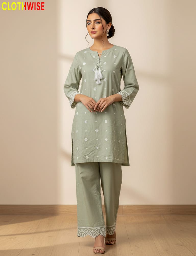 Woman wearing a oatmeal  traditional outfit with a plain background