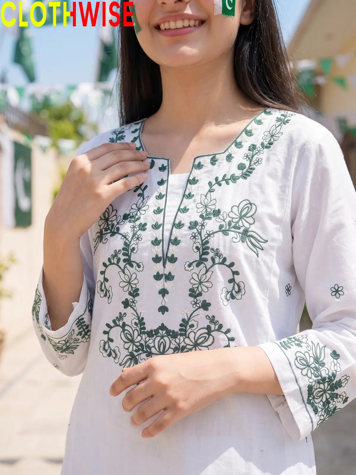 Close up of green thread embroidery on Azadi White lawn suit