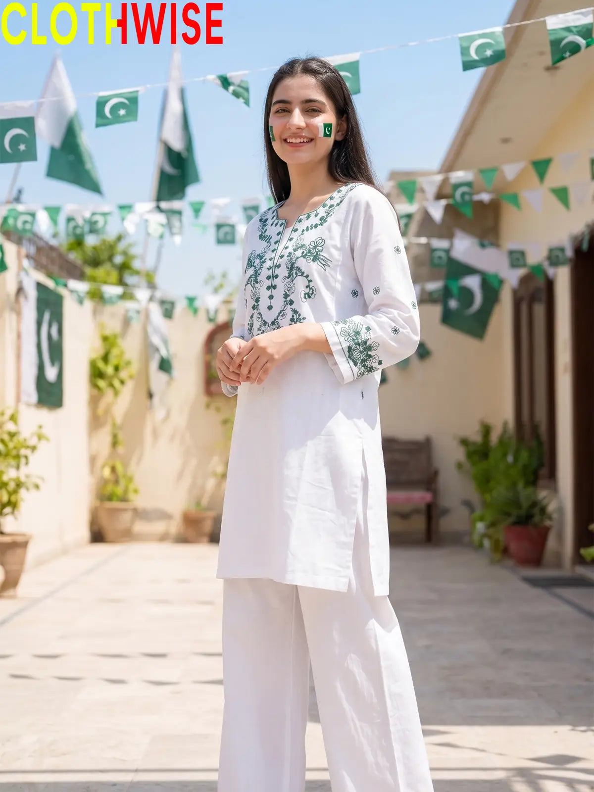 Azadi Green Thread Embroidered 2-piece lawn suit, front standing view