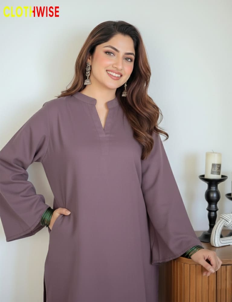 Woman wearing a purple dress with a white background, featuring the 'Clothwise' brand.