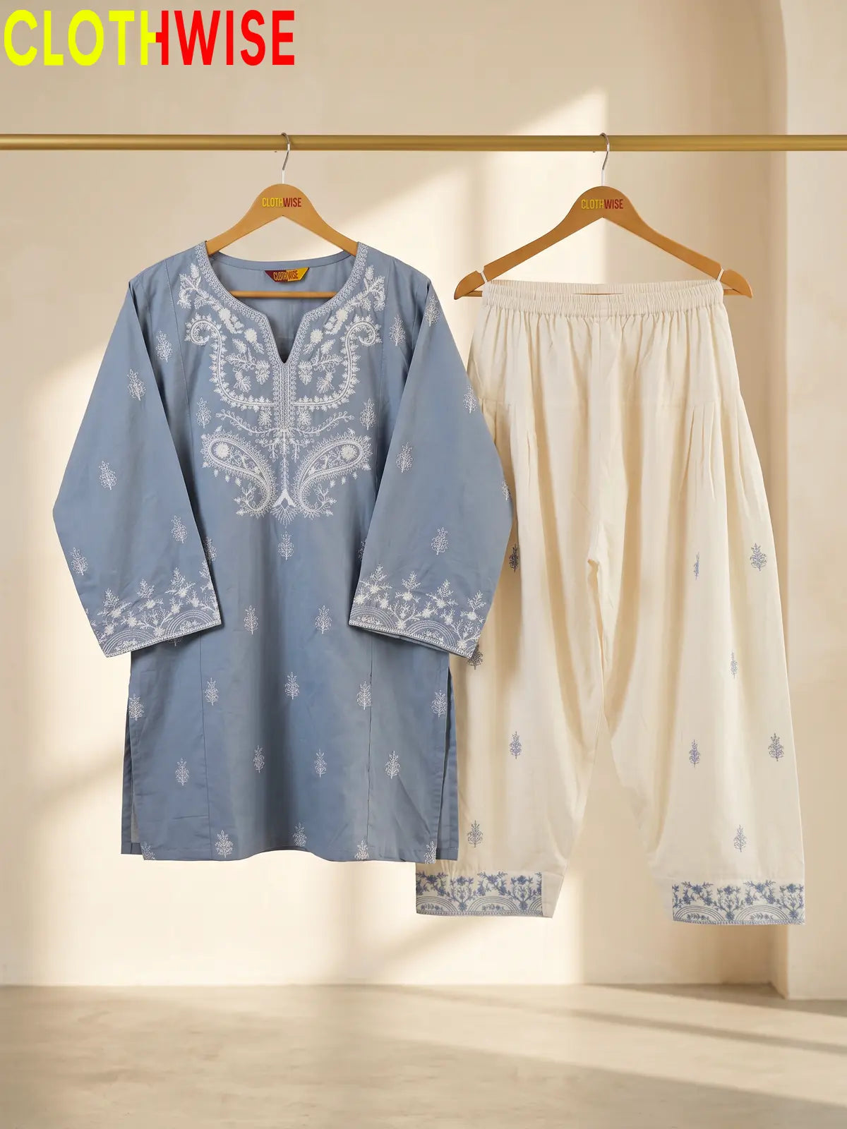 Mushq Ice Blue 2-piece embroidered cotton suit on hanger
