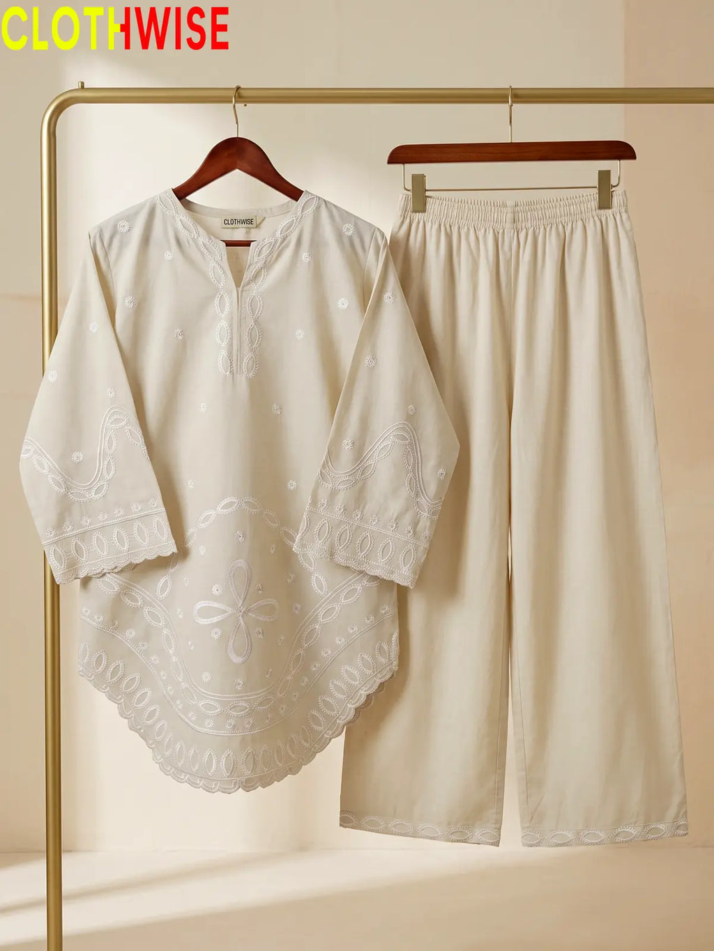 Aarzo embroidered lawn suit ivory hanger view