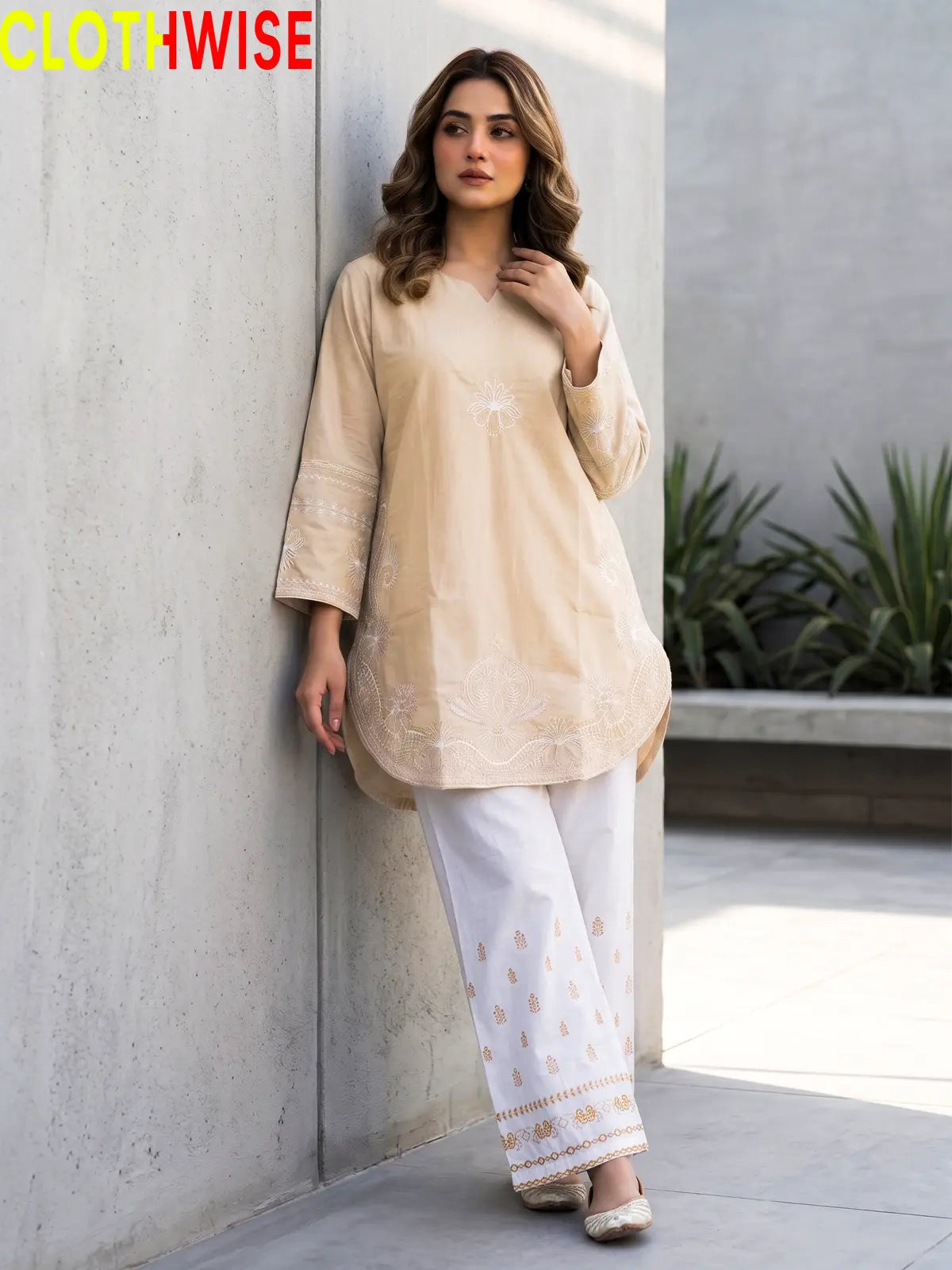 Petal embroidered cotton co-ord set in ivory - front standing view