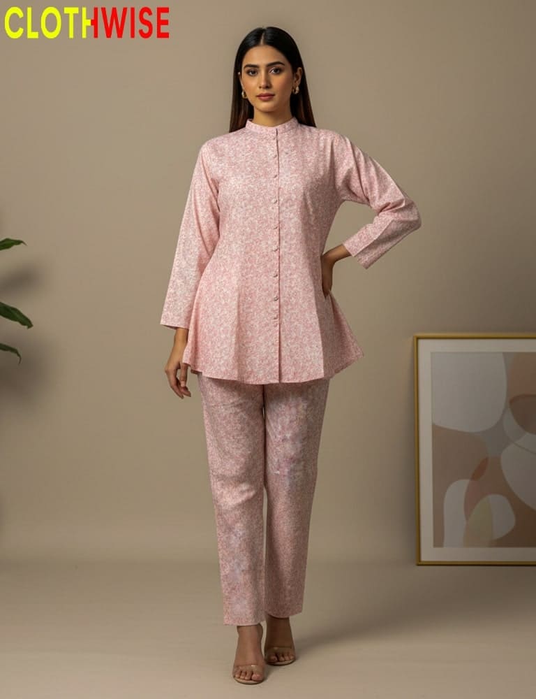 Woman wearing a pink outfit with a 'Clothwise' logo in the corner.