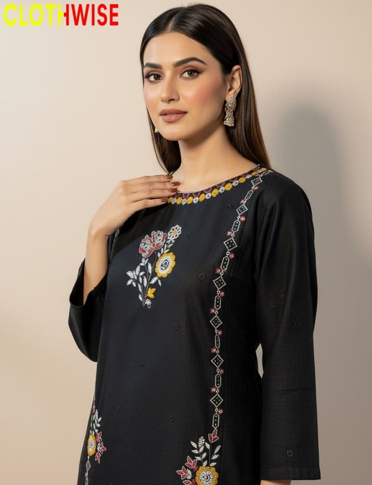 Woman wearing a black embroidered dress with a neutral background, featuring the 'ClothWise' brand.