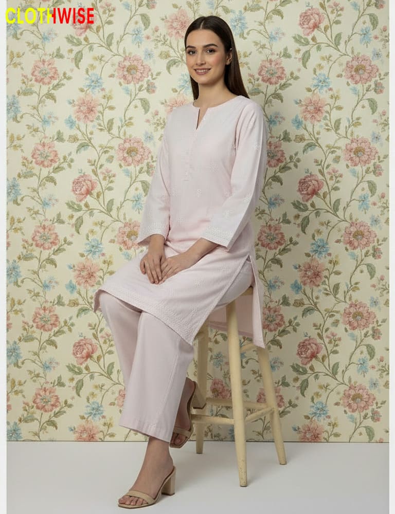Woman in a light pink outfit sitting on a stool against a floral wallpaper background, with 'ClothWise' branding.