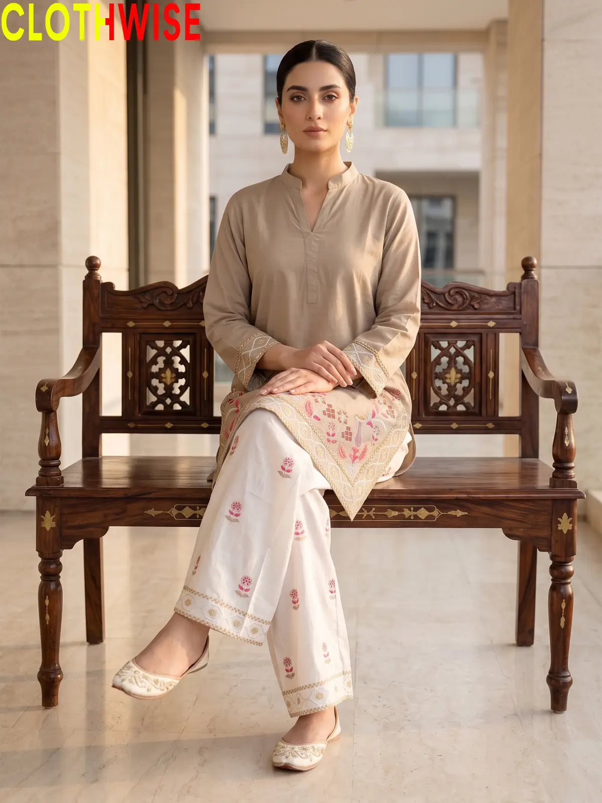 Shajar Light Khaki embroidered cotton suit sitting pose
