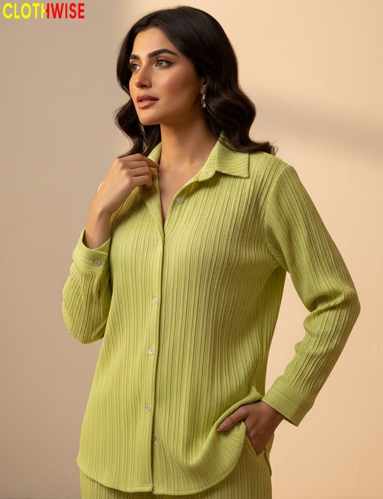 Woman wearing a green ribbed shirt against a beige background with 'CLOTHWISE' branding.