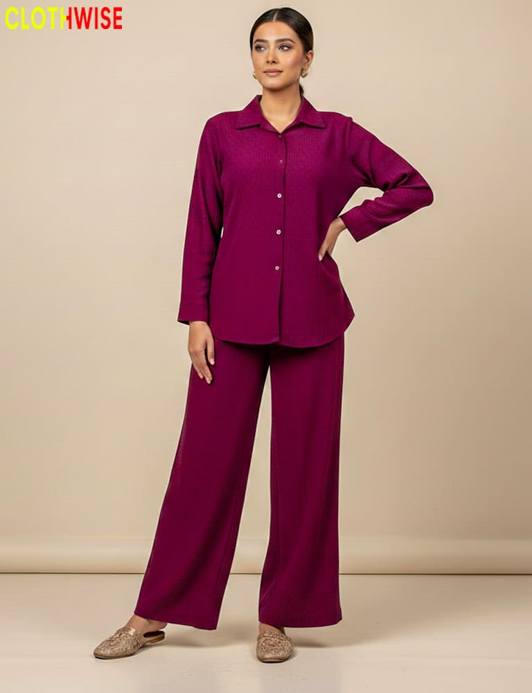 Woman wearing a magenta outfit with 'Clothwise' branding on a beige background