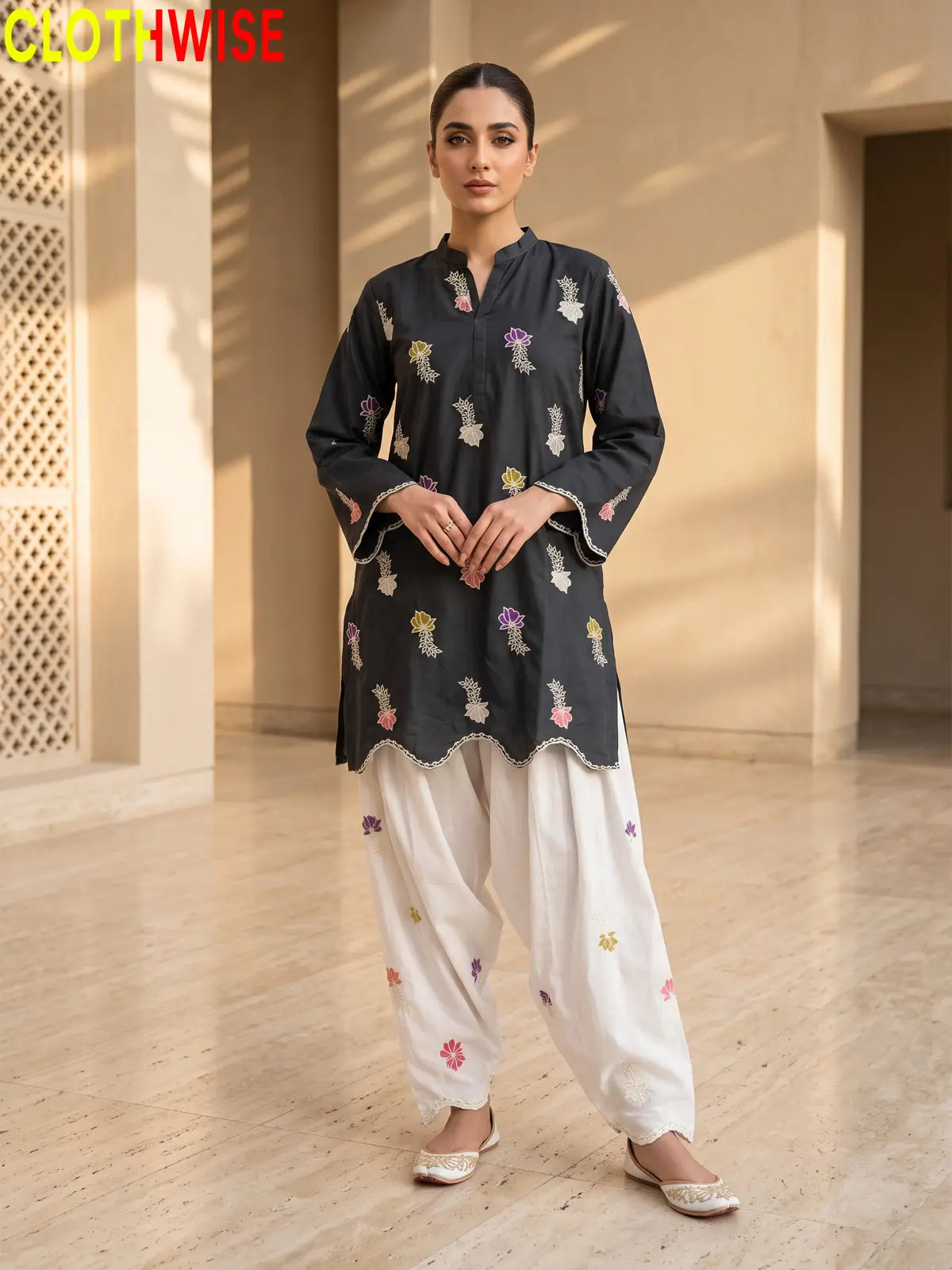 Khushi embroidered cotton suit in Malaysian Black - standing view