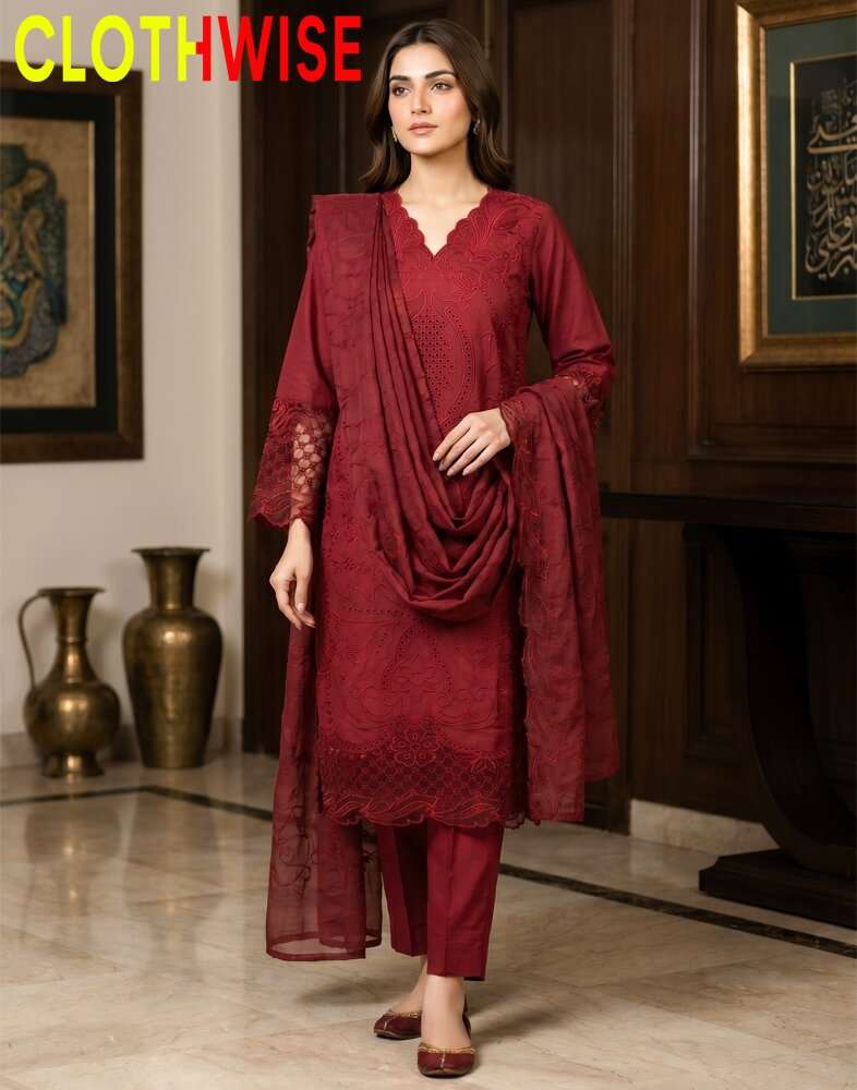 Woman wearing a maroon traditional outfit with a 'CLOTHWISE' label in the corner.