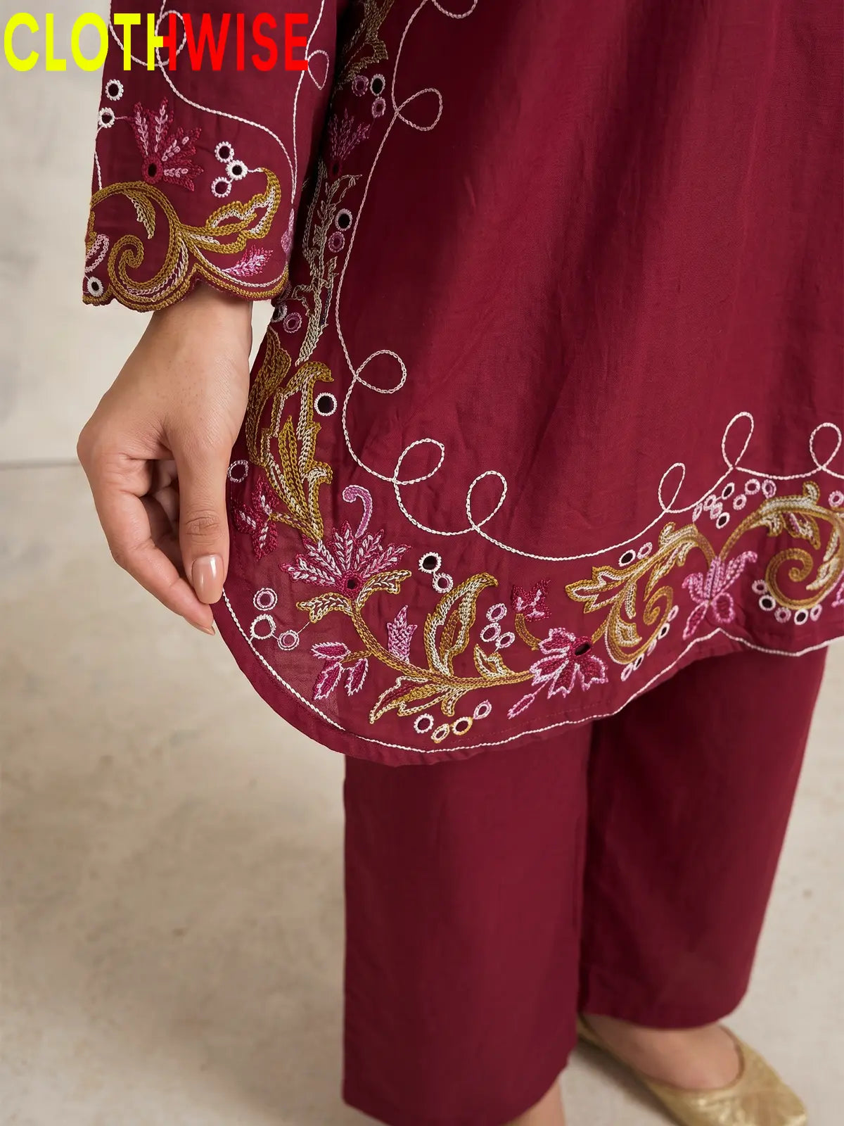 Haseen Maroon embroidered lawn suit - daman embroidery close-up
