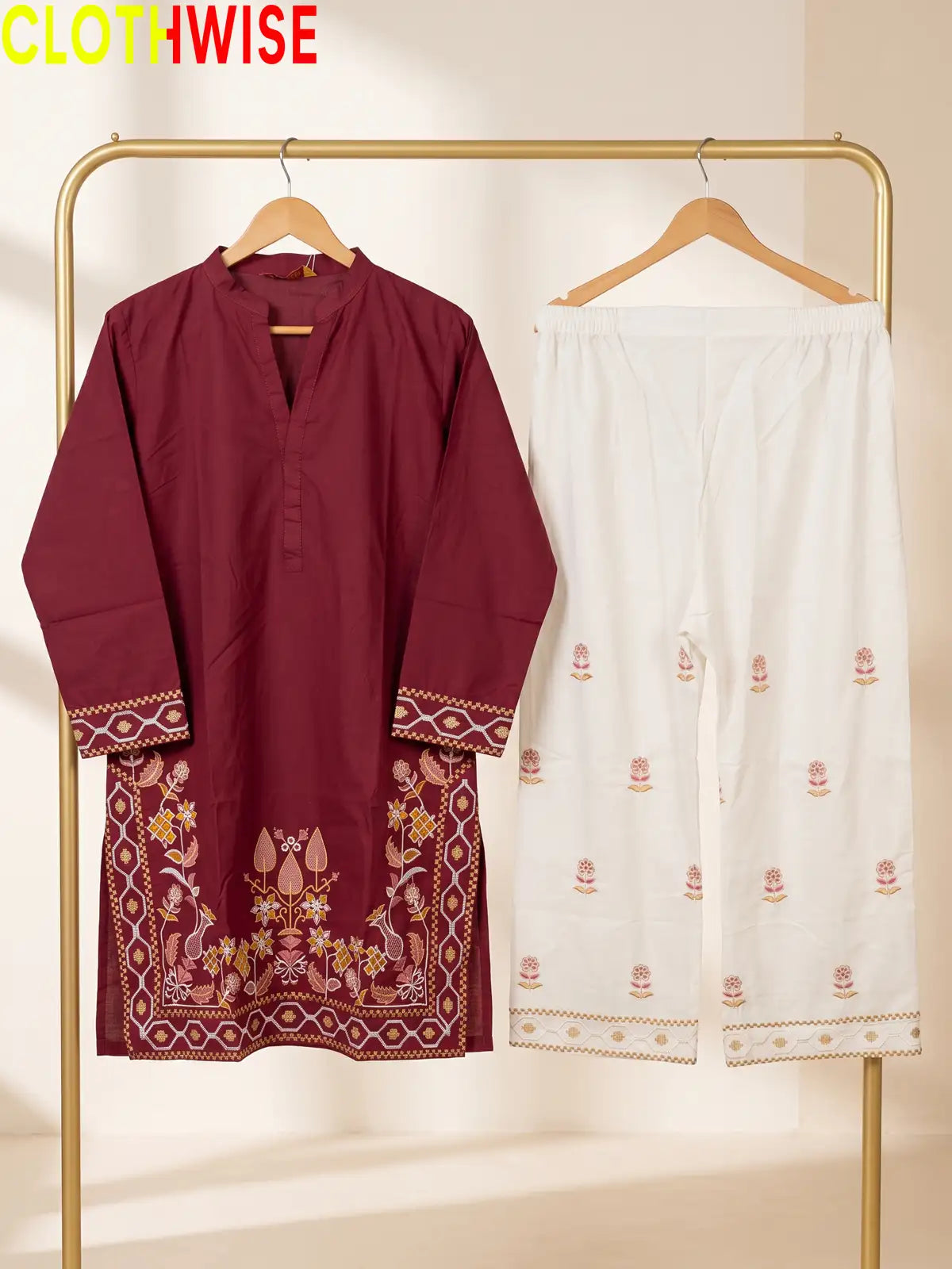 Shajar Maroon embroidered 2-piece cotton suit on hanger
