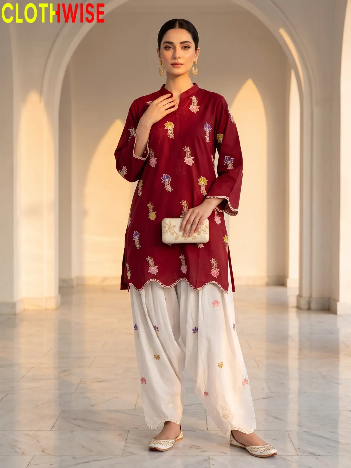 Khushi embroidered cotton suit in Maroon - standing view