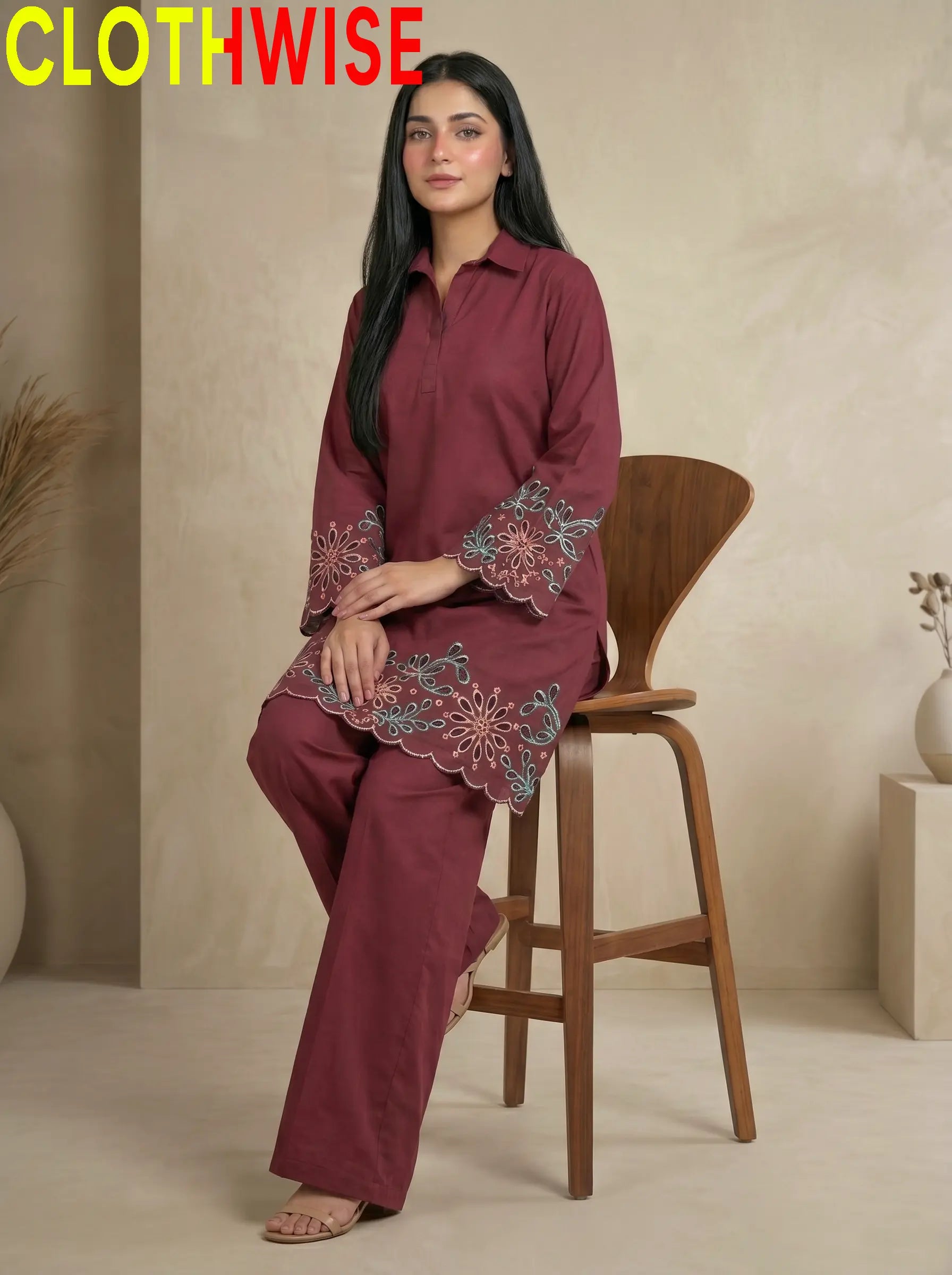 Maroon embroidered outfit with floral patterns, brand 'CLOTHWISE' visible.