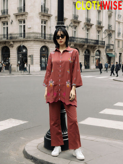 Woman in a red outfit standing on a city street with 'CLOTHWISE' branding.
