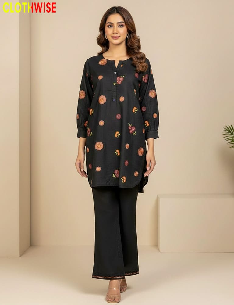 Woman wearing a black floral-patterned kurta with black pants on a beige background, branded 'ClothWise'.