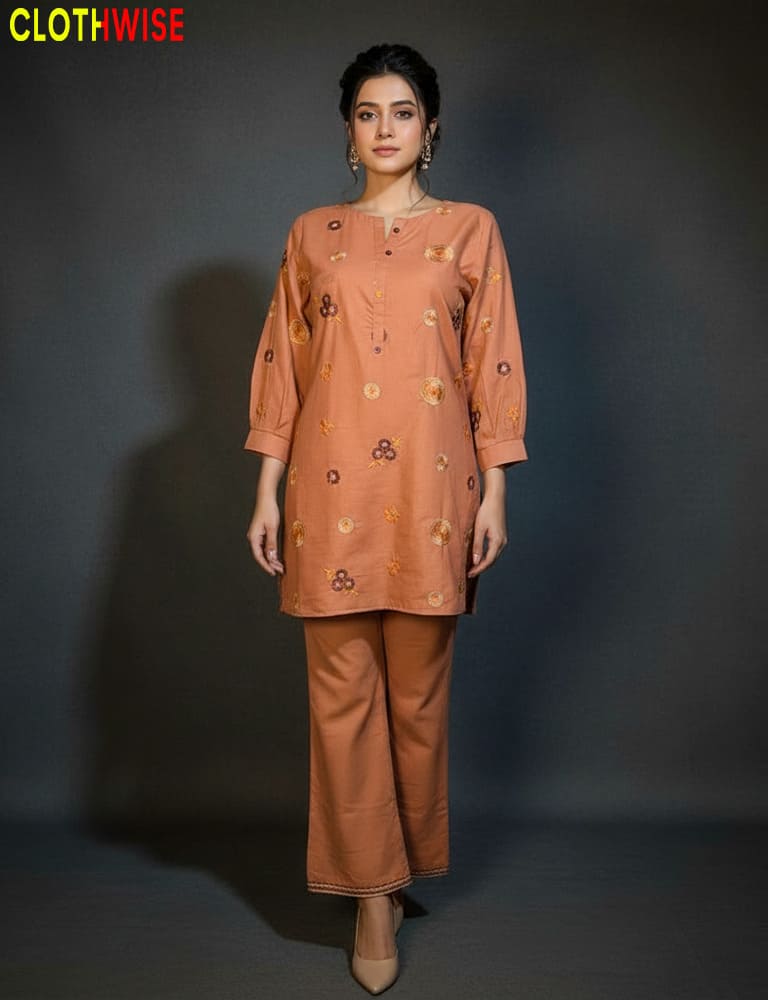 Woman wearing a brown outfit with floral patterns on a dark background, branded 'ClothWise'.