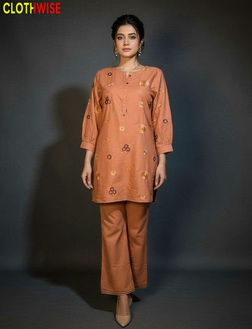 Woman wearing a brown outfit with floral patterns on a dark background, branded 'ClothWise'.