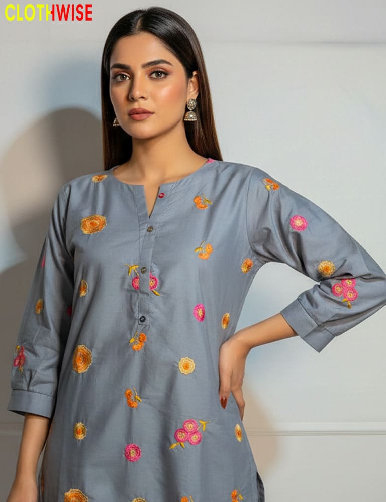 Woman wearing a gray kurta with floral embroidery, brand 'ClothWise' visible