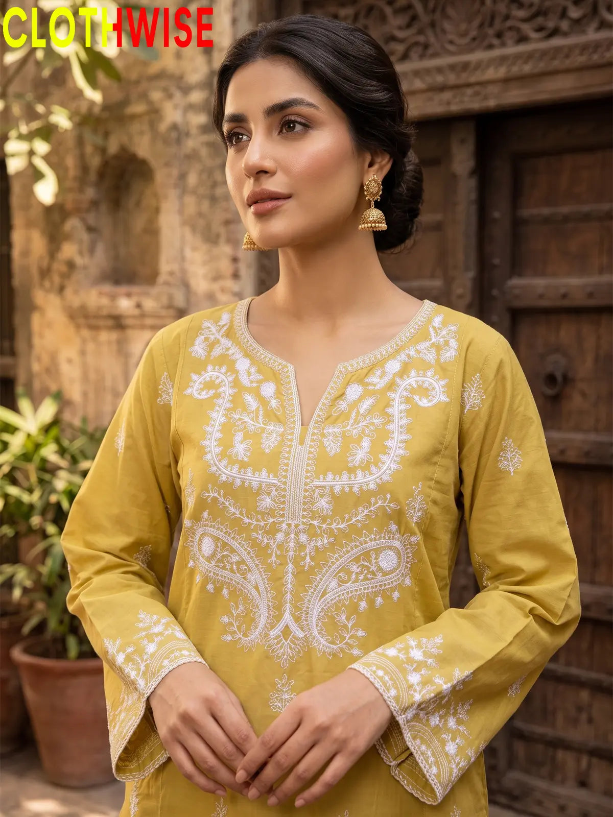 Mushq Mustard cotton suit embroidery closeup
