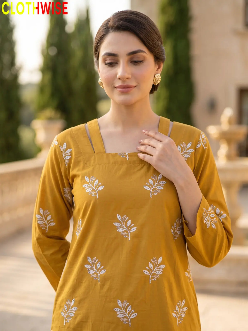 Hoor Mustard embroidery close up - CLOTHWISE