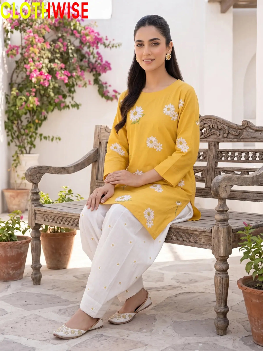 Daisy Mustard embroidered cotton suit - sitting view - CLOTHWISE