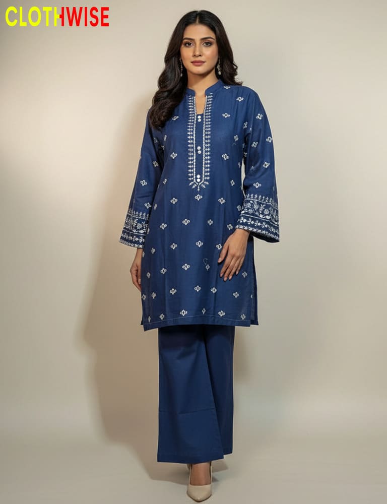 Woman wearing a blue embroidered outfit with 'Clothwise' branding on a beige background