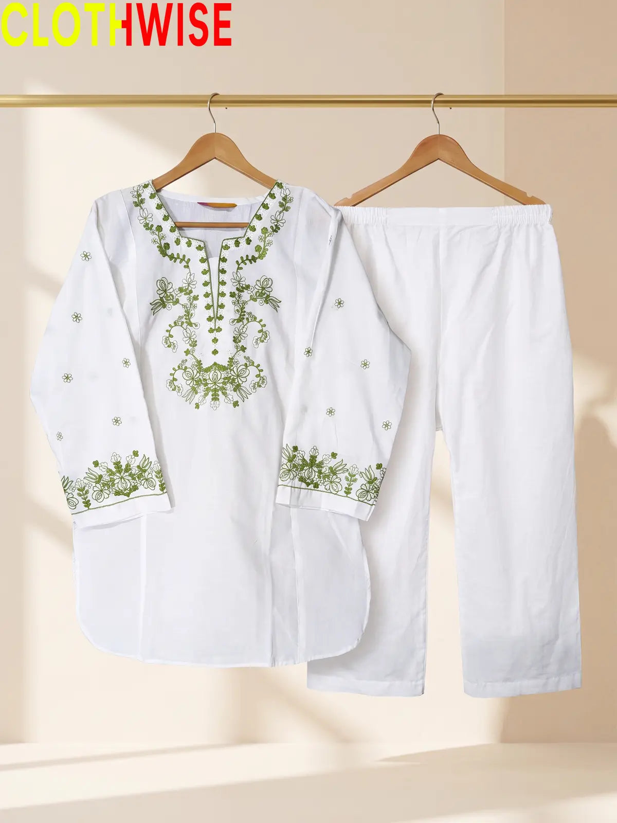 Azadi Parrot Motif Embroidered 2-piece cotton lawn suit displayed on hanger