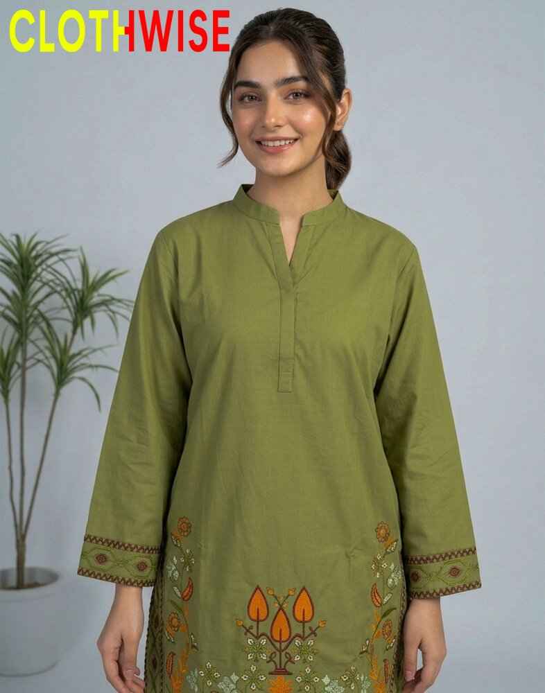 Woman wearing a green embroidered kurta with a plant in the background, branded 'CLOTHWISE'.