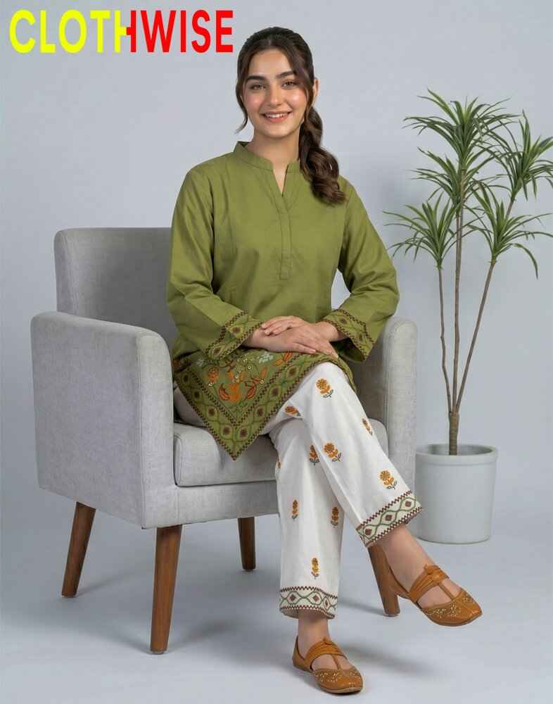 Woman sitting on a chair wearing a green kurta with white pants, with 'CLOTHWISE' branding.