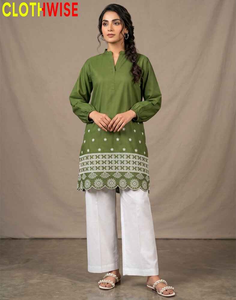 Woman wearing a green kurta with white pants against a beige background, branded 'Clothwise'.