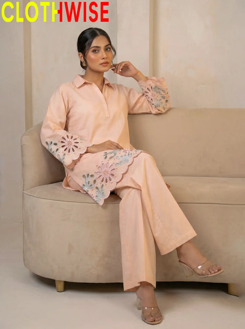 women wear a peach colour outfit by clothwise