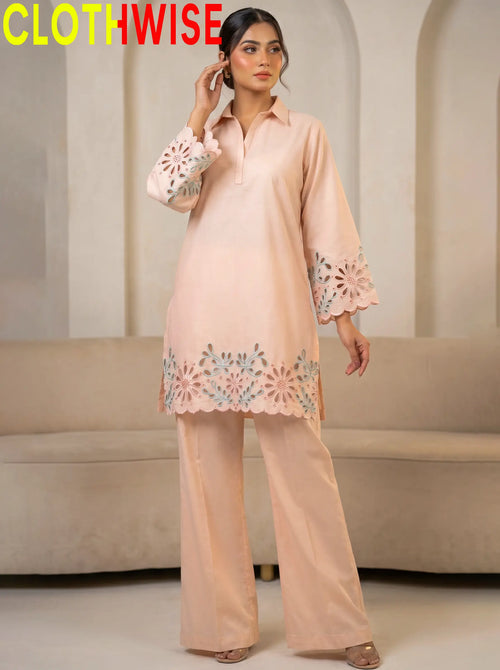 women wear a peach colour outfit by clothwise