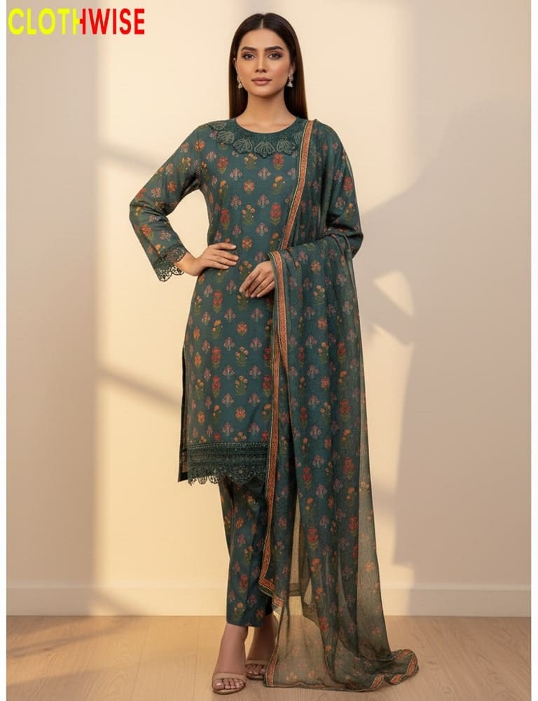 Woman wearing a green floral dress with a sheer dupatta, standing against a plain background with 'CLOTHWISE' branding.