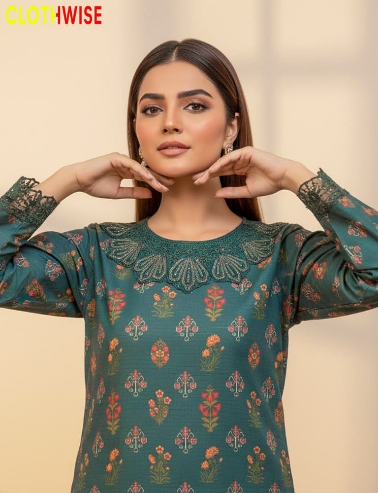 Woman wearing a green floral patterned blouse with 'Clothwise' branding.