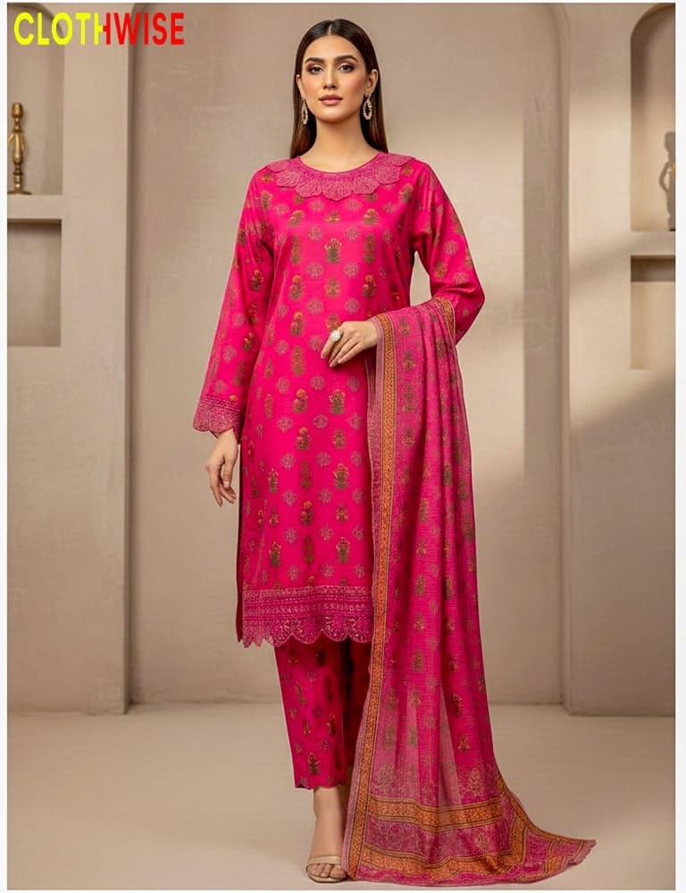 Woman wearing a pink traditional outfit with a matching dupatta in a neutral setting.