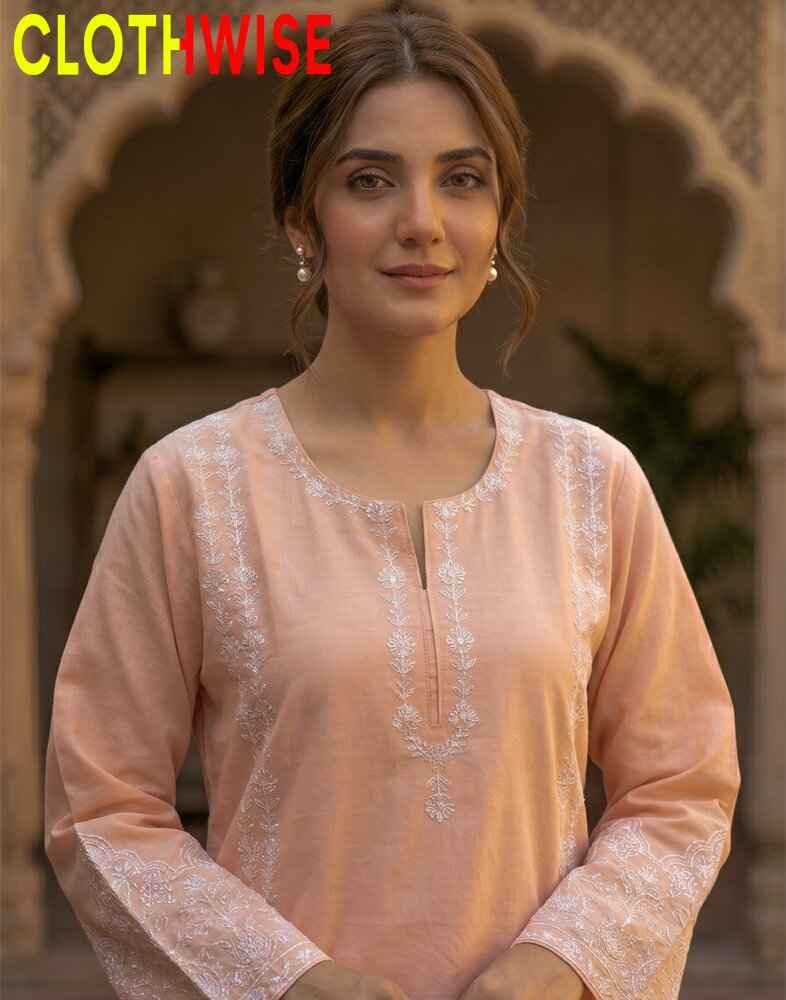 Woman wearing a peach-colored embroidered kurta with 'ClothWise' branding.