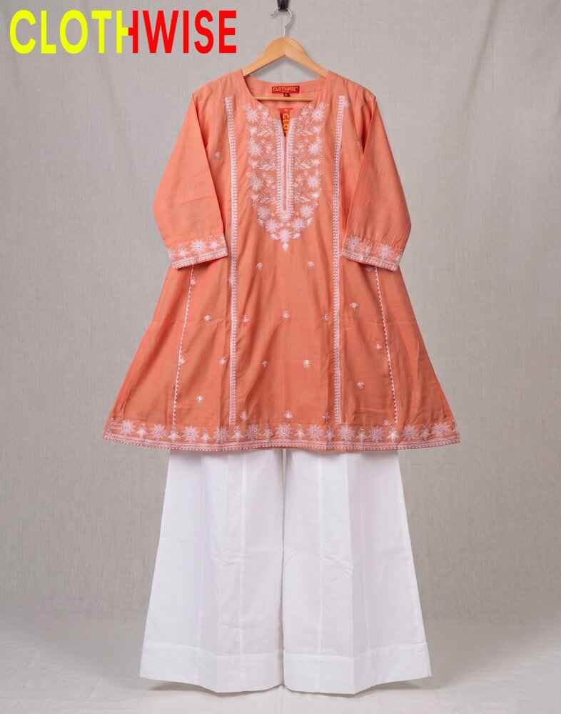 Coral pink kurta with white pants on a hanger against a plain background, branded 'ClothWise'.