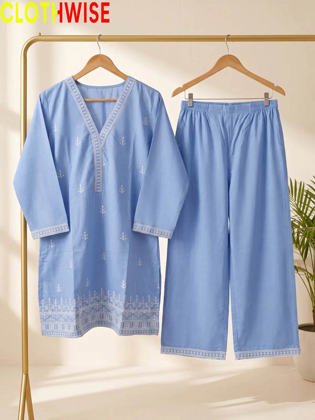 Periwinkle Cross Stitch embroidered cotton suit on hanger – CLOTHWISE