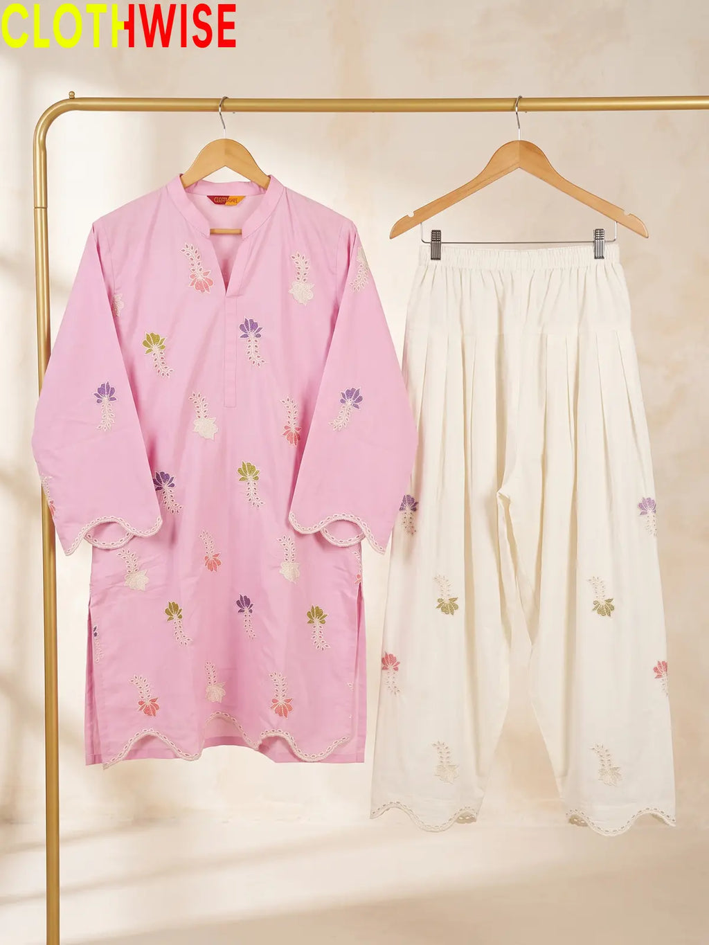 Khushi embroidered cotton suit in Pink - hanger view