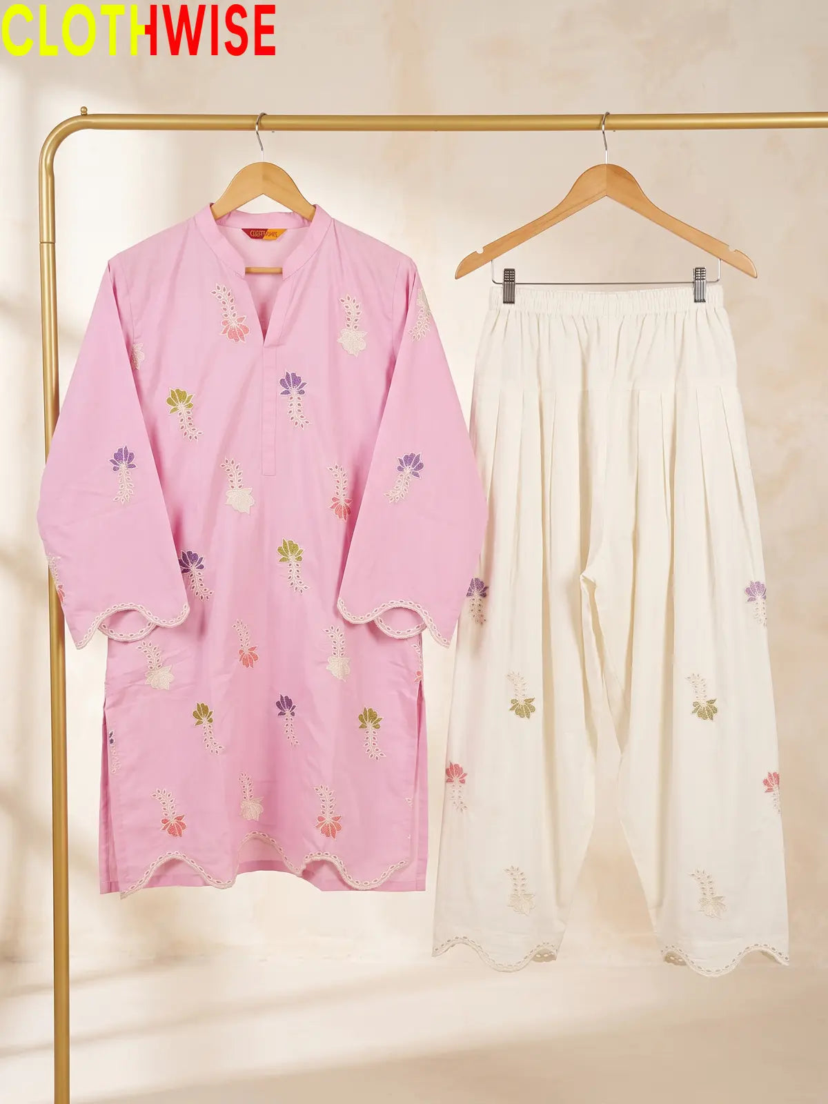 Khushi embroidered cotton suit in Pink - hanger view