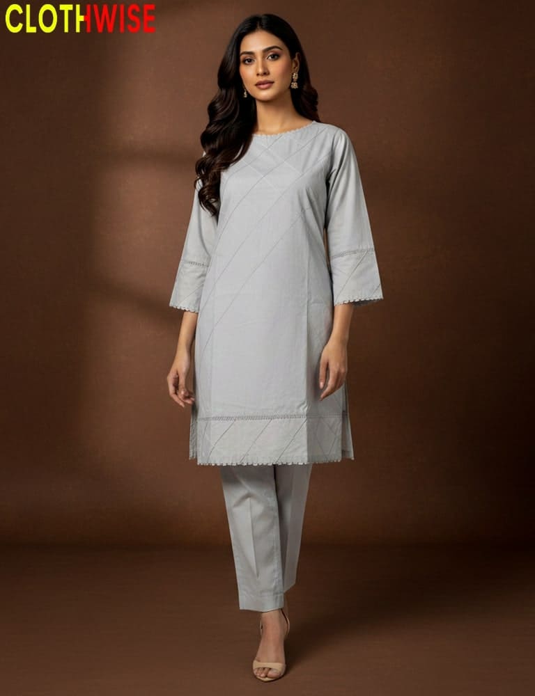 Woman wearing a light gray kurta with pants on a brown background, branded 'CLOTHWISE'.