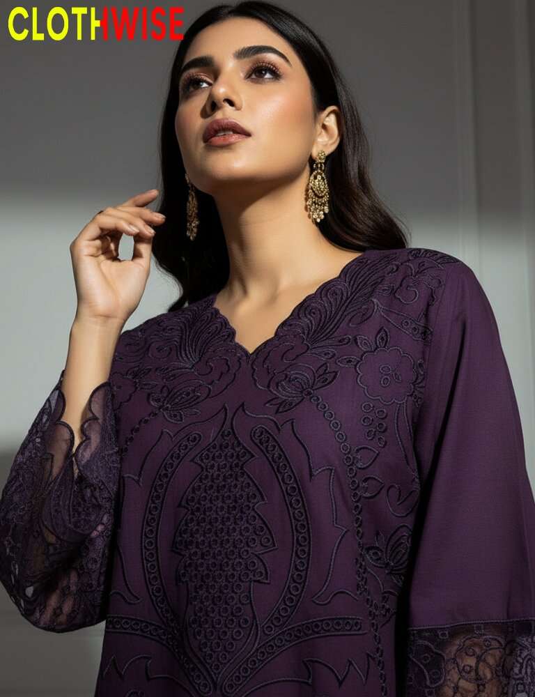 Woman wearing a purple embroidered dress with 'CLOTHWISE' branding.