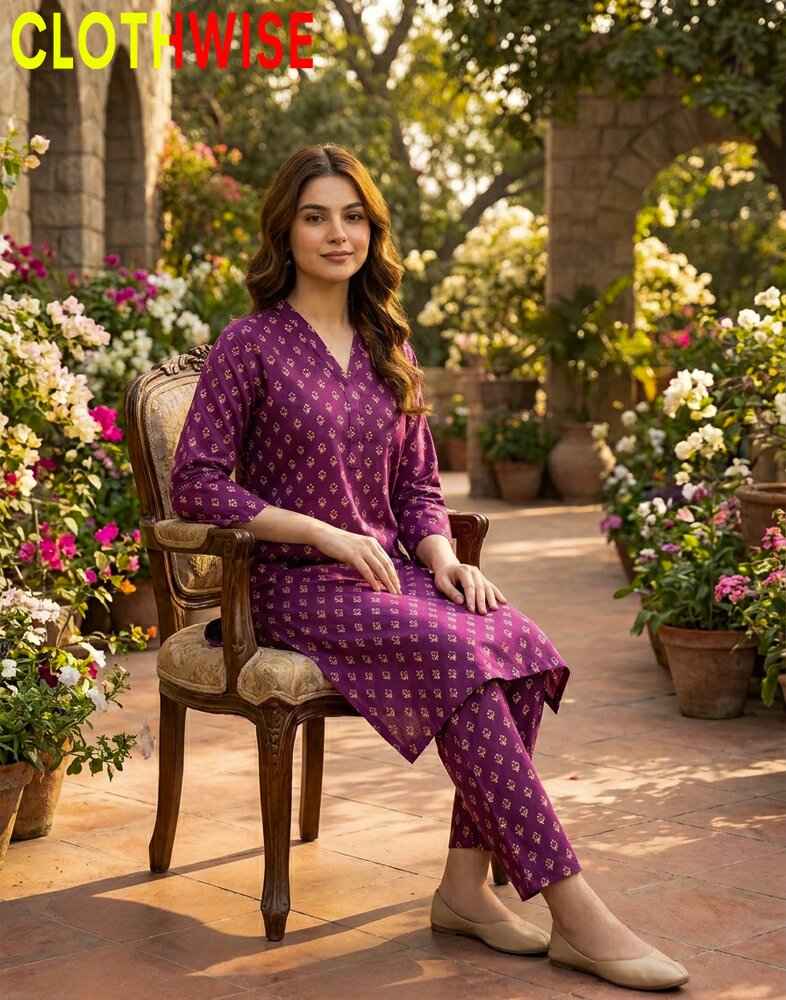 Woman in a purple outfit sitting on a chair in a garden with 'ClothWise' branding.